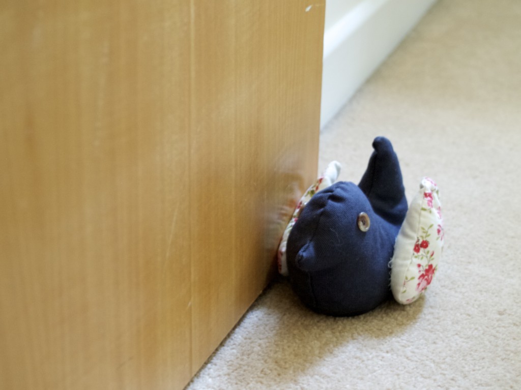 How to transform a stuffed toy into a door stopper, step-by-step DIY guide