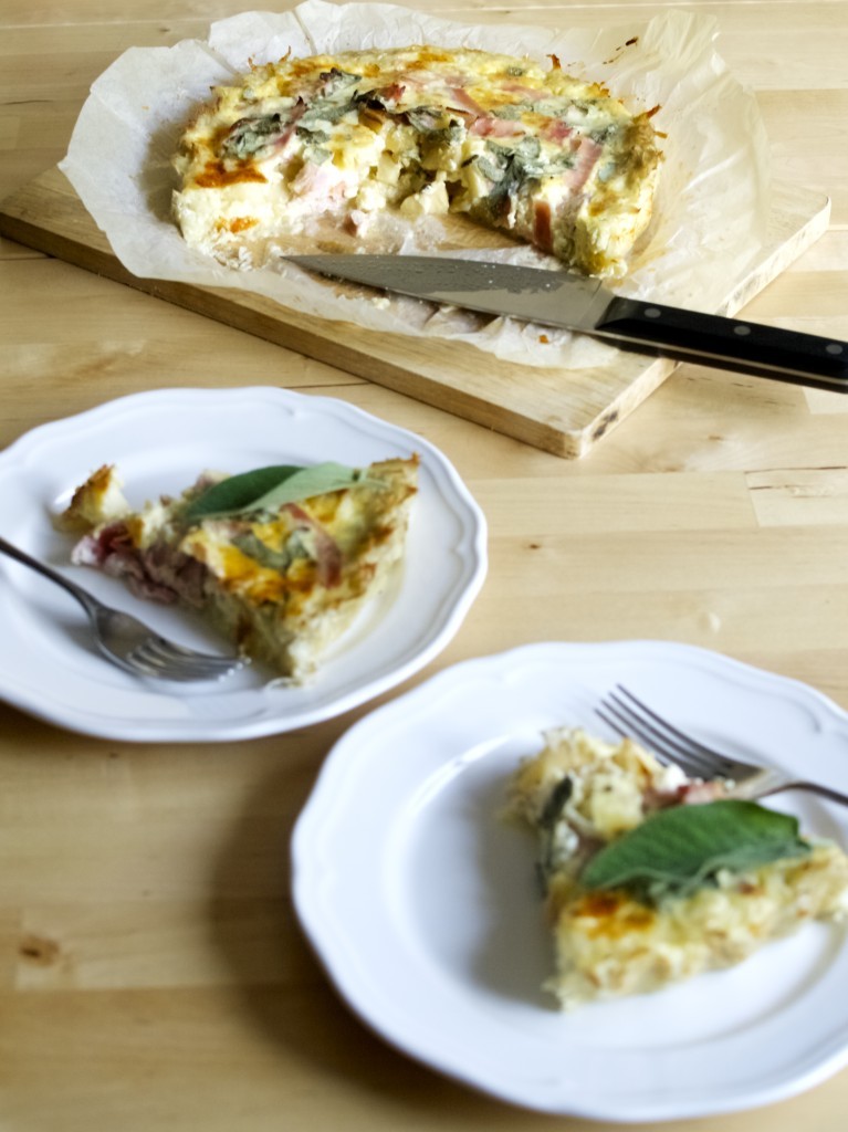 Apple and cheddar quiche with hash-brown crust